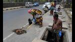Civic works before monsoon including clearing sewerage channels and keeping city roads free of potholes have been initiated in Navi Mumbai. (BACHCHAN KUMAR/HT PHOTO) Civic works before monsoon including clearing sewerage channels and keeping city roads free of potholes have been initiated in Navi Mumbai. (BACHCHAN KUMAR/HT PHOTO)