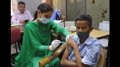 A student getting vaccinated at a special camp organised by the UT health department at GMSSS, Sector 45, in Chandigarh on Friday. The camp will continue on Saturday as well. (Keshav Singh/HT)