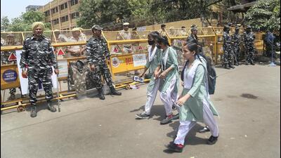 Roughly 1,500 personnel from the Delhi Police, CAPF, CRPF and RAF continue to keep guard in the area. (PTI) Roughly 1,500 personnel from the Delhi Police, CAPF, CRPF and RAF continue to keep guard in the area. (PTI)