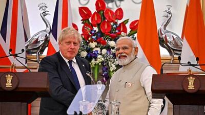 British Prime Minister Boris Johnson shakes hands with his Indian counterpart Narendra Modi during a joint press briefing at the Hyderabad House in New Delhi on Friday, April 22, 2022. (Reuters) British Prime Minister Boris Johnson shakes hands with his Indian counterpart Narendra Modi during a joint press briefing at the Hyderabad House in New Delhi on Friday, April 22, 2022. (Reuters)