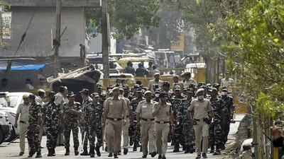Police personnel deployed in Jahangirpuri, on Friday, April 22, 2022. (Sanjeev Verma/HT) Police personnel deployed in Jahangirpuri, on Friday, April 22, 2022. (Sanjeev Verma/HT)