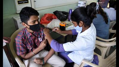 A student gets vaccinated in Navi Mumbai. The NMMC has vaccinated against Covid 19% in the 12-15 years age group with both the doses. (BACHCHAN KUMAR/HT PHOTO) A student gets vaccinated in Navi Mumbai. The NMMC has vaccinated against Covid 19% in the 12-15 years age group with both the doses. (BACHCHAN KUMAR/HT PHOTO)