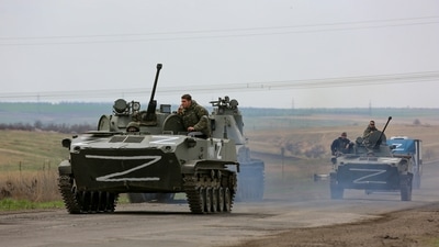 Russian military vehicles move on a highway in an area controlled by Russian-backed separatist forces near Mariupol, Ukraine. (AP)
