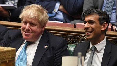 File photo of Britain's Prime Minister Boris Johnson (L) and Britain's Chancellor of the Exchequer Rishi Sunak (R). (AFP)