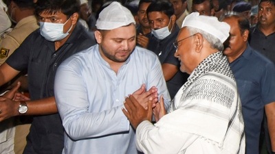 Bihar Chief Minister Nitish Kumar with RJD leader Tejashwi Yadav at an Iftar party during the holy month of Ramzan, in Patna. (PTI) Bihar Chief Minister Nitish Kumar with RJD leader Tejashwi Yadav at an Iftar party during the holy month of Ramzan, in Patna. (PTI)