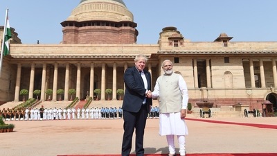 PM Modi is seen shaking hands with UK's Boris Johnson. (Twitter)&nbsp; (Twitter )
