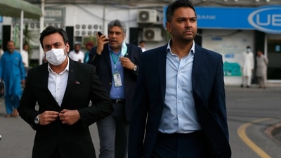 Wasim Khan (R) (AP)