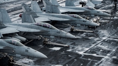 F/A-18E and 18F Super Hornets are seen on the flight deck of the Nimitz-class aircraft carrier USS Harry S. Truman (CVN 75) in the Adriatic Sea. (Reuters)