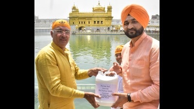 Ahead of the event, a team of the Haryana government visited Amritsar to bring the holy water of the Golden Temple sarovar for the event. (HT Photo)