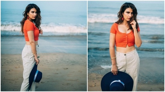 Fatima Sana Shaikh earlier did a photo shoot on the beach in an orange vest and beige linen trousers.(Instagram/@lakshetamodgil)