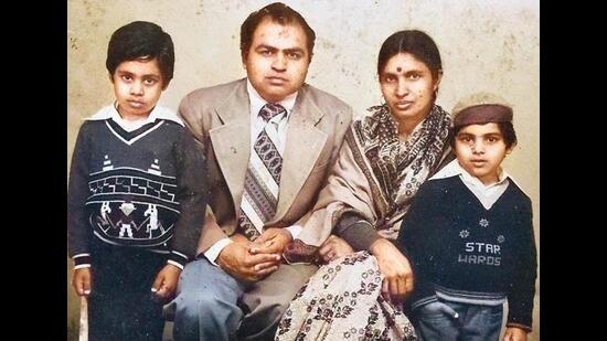 With his parents Veena and Subhash Chander Tandon, and elder brother Praveen
