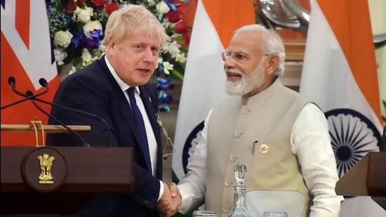 Prime Minister Narendra Modi with his British counterpart Boris Johnson at a press conference in New Delhi on Friday. (Raj K Raj/HT PHOTO)