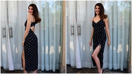 Jacqueline Fernandez went easy breezy and wore this beautiful summer black slip cut-out dress to one of the promotional events of her film Attack.(HT Photo/Varinder Chawla)