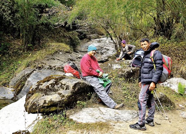 Taking a break at the wooden bridge on the way to our lunch stop, Himalaya