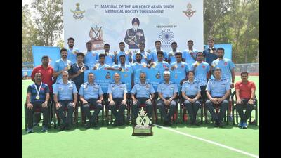 Indian Army XI after winning the hockey title in Chandigarh on Saturday. (HT Photo)