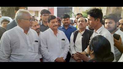 Shivpal Yadav at the postmortem house in Prayagraj on Saturday . (HT)