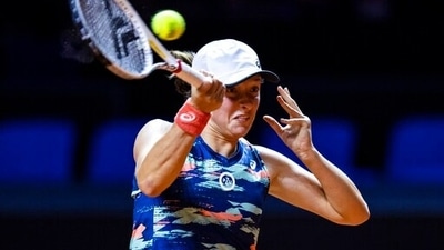 Poland's Iga Swiatek returns a ball during her WTA Tour, quarterfinal tennis match against Britain's Emma Raducanu in Stuttgart, Germany, Friday, April, 22, 2022. (AP) Poland's Iga Swiatek returns a ball during her WTA Tour, quarterfinal tennis match against Britain's Emma Raducanu in Stuttgart, Germany, Friday, April, 22, 2022. (AP)