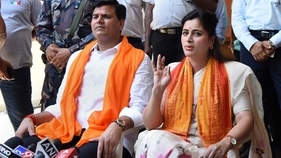 Amravati MP Navneet Kaur Rana with husband MLA Ravi Rana. (PTI) Amravati MP Navneet Kaur Rana with husband MLA Ravi Rana. (PTI)
