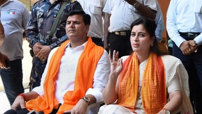 Mumbai: Amravati MP Navneet Kaur Rana with husband MLA Ravi Rana addresses a press conference, in Mumbai, Friday, April 22, 2022. (PTI Photo) (PTI) Mumbai: Amravati MP Navneet Kaur Rana with husband MLA Ravi Rana addresses a press conference, in Mumbai, Friday, April 22, 2022. (PTI Photo) (PTI)