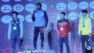 Dahiya produced a dominating display to become the first Indian wrestler to win three consecutive Asian championships titles (PTI) Dahiya produced a dominating display to become the first Indian wrestler to win three consecutive Asian championships titles (PTI)