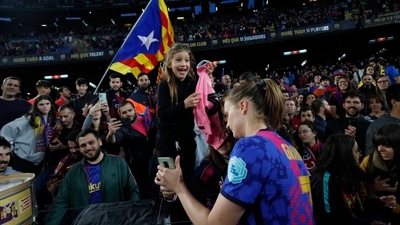 Women’s Champions League - Semi Final - First Leg - FC Barcelona v VfL Wolfsburg - Camp Nou, Barcelona, Spain - April 22, 2022 FC Barcelona's Caroline Graham Hansen celebrates with fans after the match (REUTERS)