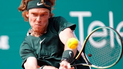 Andrey Rublev of Russia returns a ball to Czech Republic's Jiri Lehecka during their tennis quarter final match of the Serbia Open tennis tournament in Belgrade. (AP)