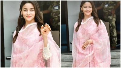 Alia Bhatt flaunted her radiant look as she stopped to say hi to the paparazzi at Mumbai airport.&nbsp; (HT Photo/Varinder Chawla)