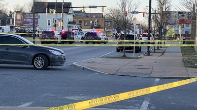 Police vehicles and crime scene tape block an area where three police officers were hit by gunfire during a pursuit, Tuesday March 29, 2022, in Buffalo, NY. The Buffalo Police Department says their injuries don't appear to be life-threatening. (Hannah Buehler/7 News WKBW via AP) (AP) Police vehicles and crime scene tape block an area where three police officers were hit by gunfire during a pursuit, Tuesday March 29, 2022, in Buffalo, NY. The Buffalo Police Department says their injuries don't appear to be life-threatening. (Hannah Buehler/7 News WKBW via AP) (AP)