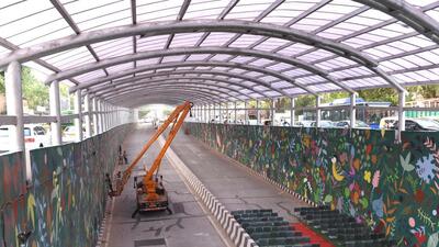 Workers give final touches to the Ashram Chowk underpass on Saturday, April 23, 2022. (Arvind Yadav/HT) Workers give final touches to the Ashram Chowk underpass on Saturday, April 23, 2022. (Arvind Yadav/HT)