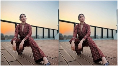 Amyra played muse to fashion designer Drishti and Zahabia and picked a maroon pantsuit for the pictures. (Instagram/@amyradastur93)