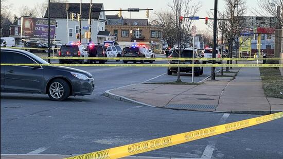 Police vehicles and crime scene tape block an area where three police officers were hit by gunfire during a pursuit, Tuesday March 29, 2022, in Buffalo, NY. The Buffalo Police Department says their injuries don't appear to be life-threatening. (Hannah Buehler/7 News WKBW via AP) (AP)