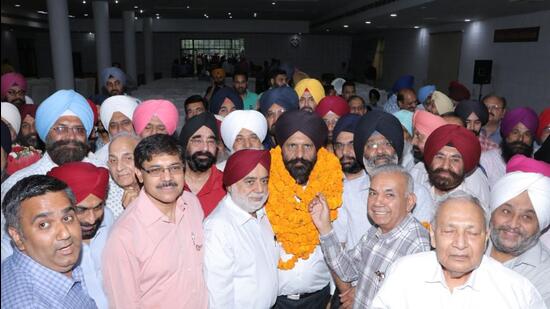 Upkar Singh Ahuja being welcomed as the Chamber of Industrial and Commercial Undertakings president at CICU Complex, Focal Point in Ludhiana. (HT PHOTO)