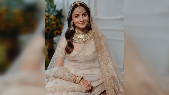 A dream come true, Alia Bhatt's wedding is. In a white Sabyasachi lehenga, the actress exuded pure diva glamour.(Instagram/@aliaabhatt)