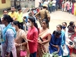 Voters wait in queues to cast their votes for the Guwahati Municipal Corporation (GMC) elections, at a polling station, in Guwahati on Friday. (ANI Photo) Voters wait in queues to cast their votes for the Guwahati Municipal Corporation (GMC) elections, at a polling station, in Guwahati on Friday. (ANI Photo)