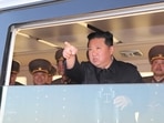 North Korean leader Kim Jong Un gestures as he watches the test-firing of a new-type tactical guided weapon according to state media.