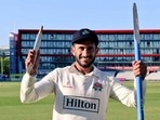 Hasan Ali poses for a photo with the broken stump.&nbsp;