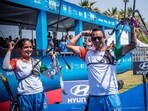Recurve mixed team of Tarundeep Rai and Ridhi Phor celebrate after their triumph.(Twitter/worldarchery)