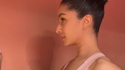 A wave of pastel-coloured pieces is currently ruling the wardrobes and runaways, even midriff-baring style, as the warm-weather trends and Shraddha Kapoor's latest viral pictures laid sartorial cues on how to ditch the more saturated athleisure wears and inspired millennial fashion in trendy pastel pink track set.&nbsp; (Instagram/shraddhakapoor)