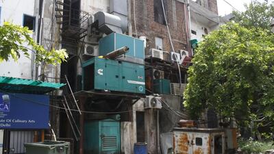 Gurugram, India - June 15, 2018: Heavy Diesel Generator sets installed across the busy market complex at Old DLF Sector 14, in Gurugram, India, on Friday, June 15, 2018. (Photo by Yogendra Kumar/ Hindustan Times) to go with power package series part-02 (Yogendra Kumar/HT PHOTO) Gurugram, India - June 15, 2018: Heavy Diesel Generator sets installed across the busy market complex at Old DLF Sector 14, in Gurugram, India, on Friday, June 15, 2018. (Photo by Yogendra Kumar/ Hindustan Times) to go with power package series part-02 (Yogendra Kumar/HT PHOTO)