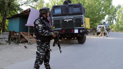 Security personnel stand guard near the encounter site in Pahoo area in Pulwama on Sunday. (ANI) Security personnel stand guard near the encounter site in Pahoo area in Pulwama on Sunday. (ANI)