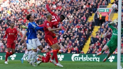 Origi, center, scores Liverpool's second against Everton at Anfield (AP) Origi, center, scores Liverpool's second against Everton at Anfield (AP)