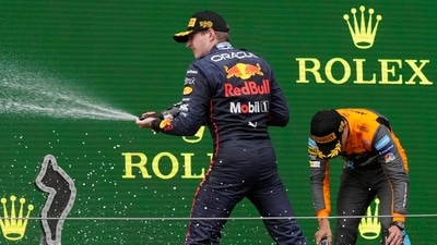 Red Bull driver Max Verstappen, of the Netherlands, celebrates on the podium after winning the Emilia Romagna Formula One Grand Prix (AP) Red Bull driver Max Verstappen, of the Netherlands, celebrates on the podium after winning the Emilia Romagna Formula One Grand Prix (AP)