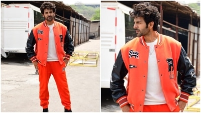 Kartik rounded off his ensemble with orange pants and black high-ankle sneakers. In the end, Kartik's signature hairdo - a back-swept messy look - and groomed beard rounded off his Bhool Bhulaiyaa 2 promotions look. (HT Photo/Varinder Chawla) Kartik rounded off his ensemble with orange pants and black high-ankle sneakers. In the end, Kartik's signature hairdo - a back-swept messy look - and groomed beard rounded off his Bhool Bhulaiyaa 2 promotions look. (HT Photo/Varinder Chawla)