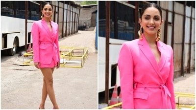 Kiara went shirtless with the blazer and completed her ensemble by wearing a chic skirt. It has a mini hem length flaunting the star's long legs and a wrapover silhouette. In the end, Kiara chose statement accessories to round it all off. She wore gold triple hoop earrings and bubblegum pink pointed stilettos. (HT Photo/Varinder Chawla) Kiara went shirtless with the blazer and completed her ensemble by wearing a chic skirt. It has a mini hem length flaunting the star's long legs and a wrapover silhouette. In the end, Kiara chose statement accessories to round it all off. She wore gold triple hoop earrings and bubblegum pink pointed stilettos. (HT Photo/Varinder Chawla)