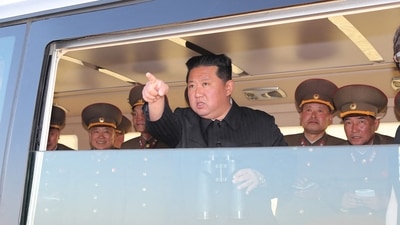 North Korean leader Kim Jong Un gestures as he watches the test-firing of a new-type tactical guided weapon according to state media. (via Reuters)