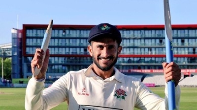 Hasan Ali poses for a photo with the broken stump. (Twitter/lancscricket) Hasan Ali poses for a photo with the broken stump. (Twitter/lancscricket)