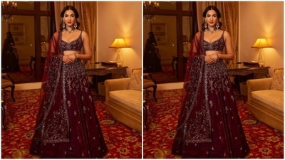Sonal paired a sleeveless midriff-baring wine-red blouse intricately embroidered in silver resham threads with a long flowy skirt. She teamed it with a dupatta with zari and silver mirror work. (Instagram/@sonalchauhan)