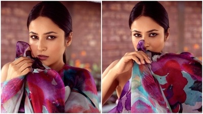 Shehnaaz Gill is effortless queen in colourful one-shoulder dress for magical photoshoot: Check out pics (Instagram/@shehnaazgill) Shehnaaz Gill is effortless queen in colourful one-shoulder dress for magical photoshoot: Check out pics (Instagram/@shehnaazgill)