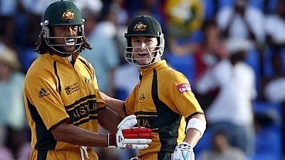 Andrew Symonds (L) and Michael Clarke. (REUTERS) Andrew Symonds (L) and Michael Clarke. (REUTERS)