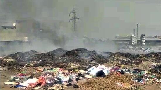 Four days after seven members of a family living near the Tajpur Road dump died after their shanty caught fire, another fire broke out at the garbage dump on Sunday. (Harvinder Singh/HT)